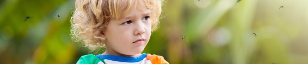 child surrounded by mosquitoes in backyard showing how to get rid of mosquitoes in your backyard