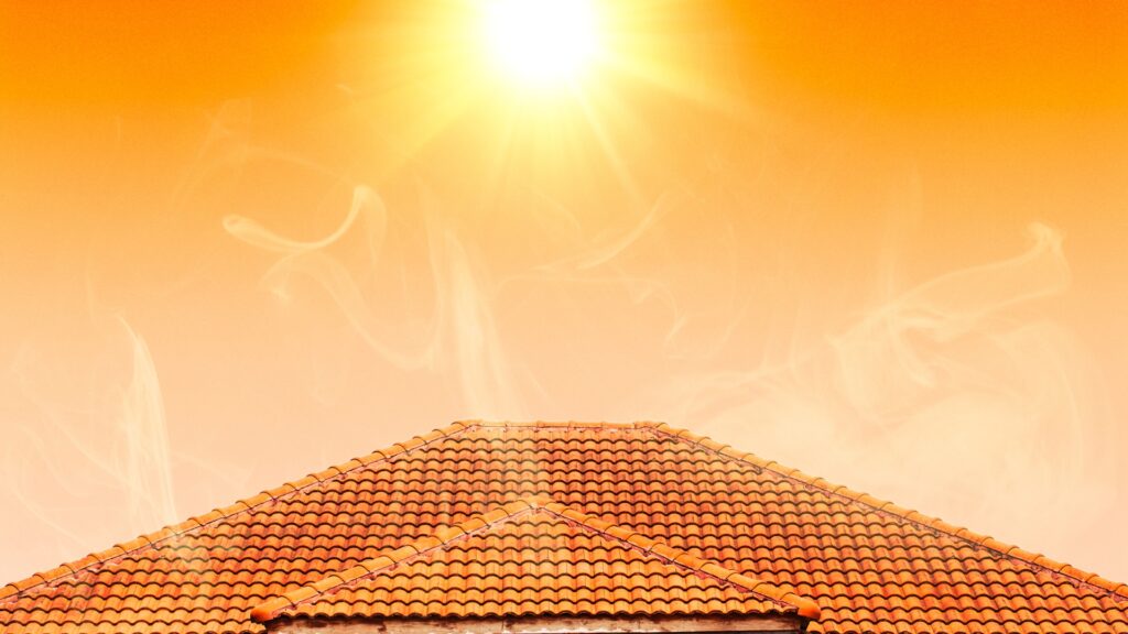 roof baking in summer sun causing hot house interior