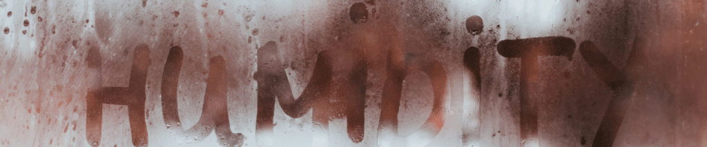 indoor humidity in winter - humidity written on a foggy window